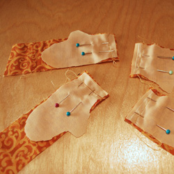 Pin and sew hand pieces.